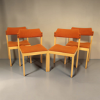 Vintage Space 4er-Set Mid Century Esszimmerstühle mit hellem Holzgestell und orangefarbenem Stoffbezug